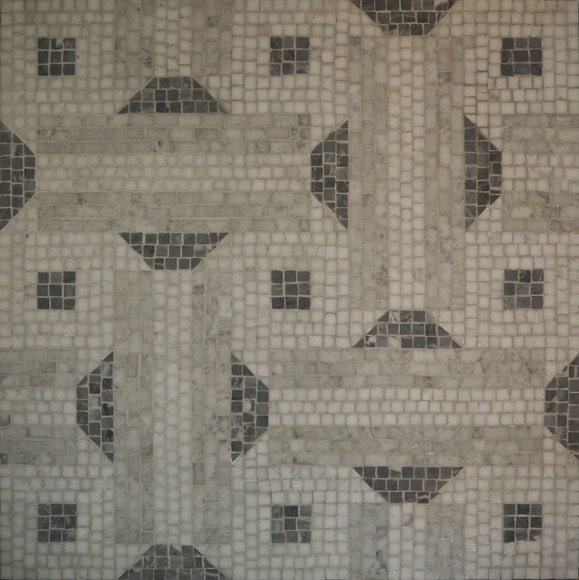 Mosaico per pavimento. Decoro geometrico